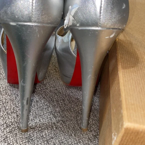 Christian Louboutin Metallic Silver Heels with Iconic Red Soles - Picture 7 of 9